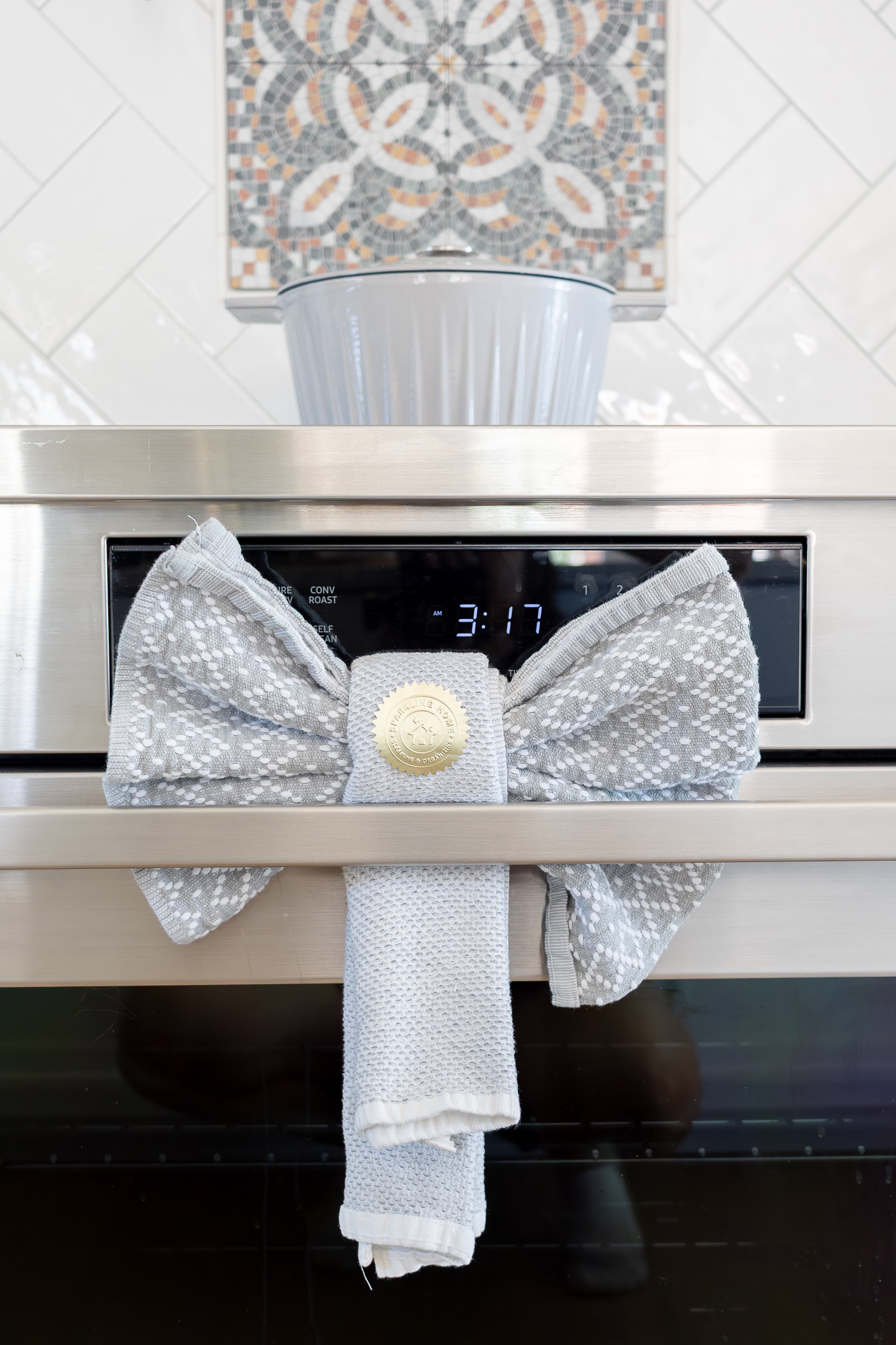 Person cleaning kitchen sink