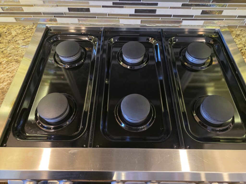Gas range, burners and drip pans - after cleaning